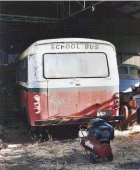 Austin school bus rebuild t83 in farmers shed waiting for loading 2